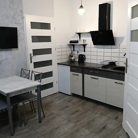 Domki Pod Katalpami * Mikołajki